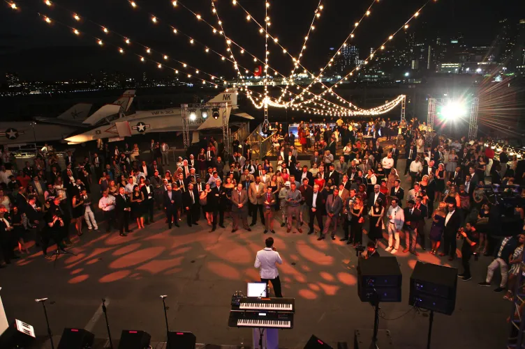 Evening Flight Deck event with a band and room for dancing under string lights